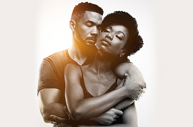Cherish the Day. Black woman and Black man, both wearing dark t-shirts and facing forward, embrace with eyes closed.