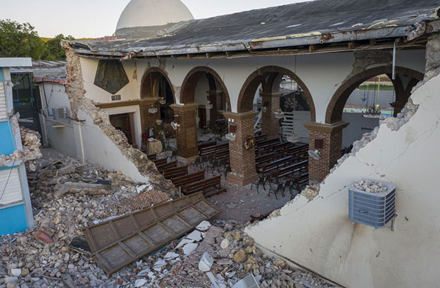 Puerto Rico. Building with destroyed exterior following earthquake.