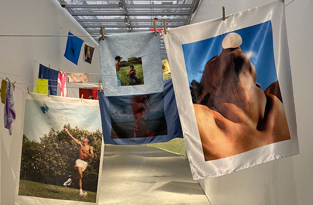 Tyler Mitchell art. Various oversized photographs hanging in art gallery before final installations.