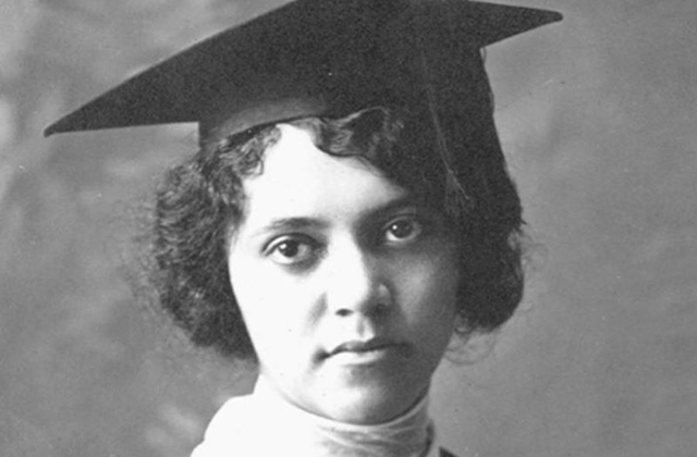 Alice Ball. Archival photo of young Black woman with short curly hair wearing a black graduation cap and white top.