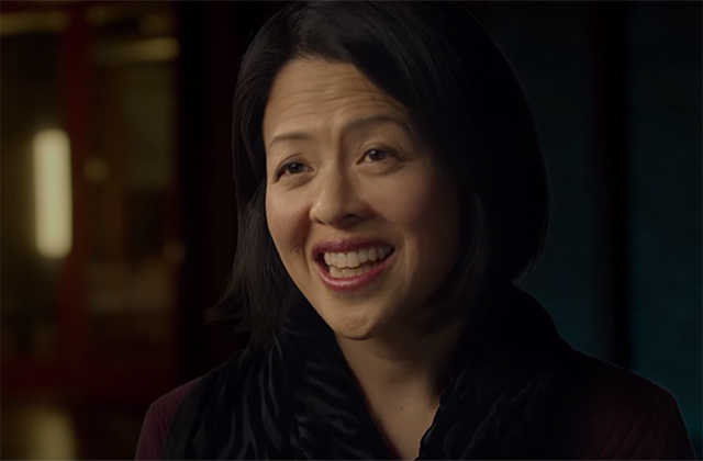 Jeanne Tsai. Asian American woman with shoulder length black hair, wearing a black top.