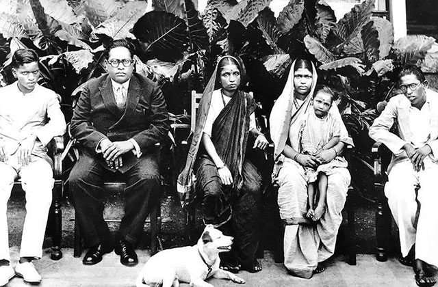 B.R. Ambedkar. Black and white archival photo of an Indian family consisting of five members and dog.