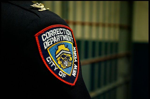 Close up shot of a Correction Department badge on an officer at the Vernon C. Bain Correctional Center at Rikers Island, in the Bronx, New York.