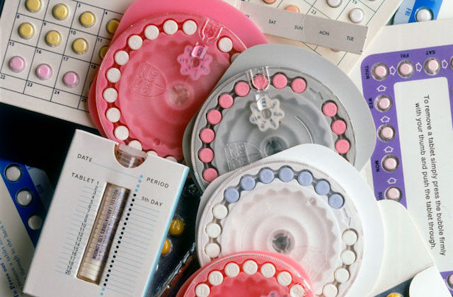 A collection of different packages and brands of oral contraception