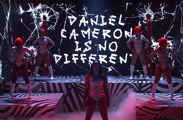 Megan Thee Stallion. Black and white stage props with five black women on stage wearing black and white costumes.