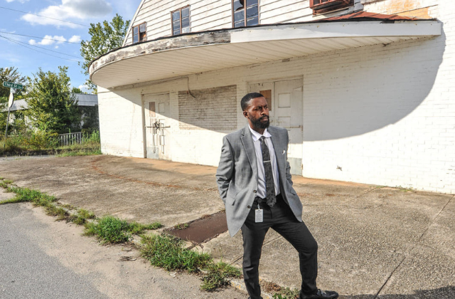 City Planner, Weston Stroud, in front of the Roxy Theater in Greenwood Bottom, Georgia.