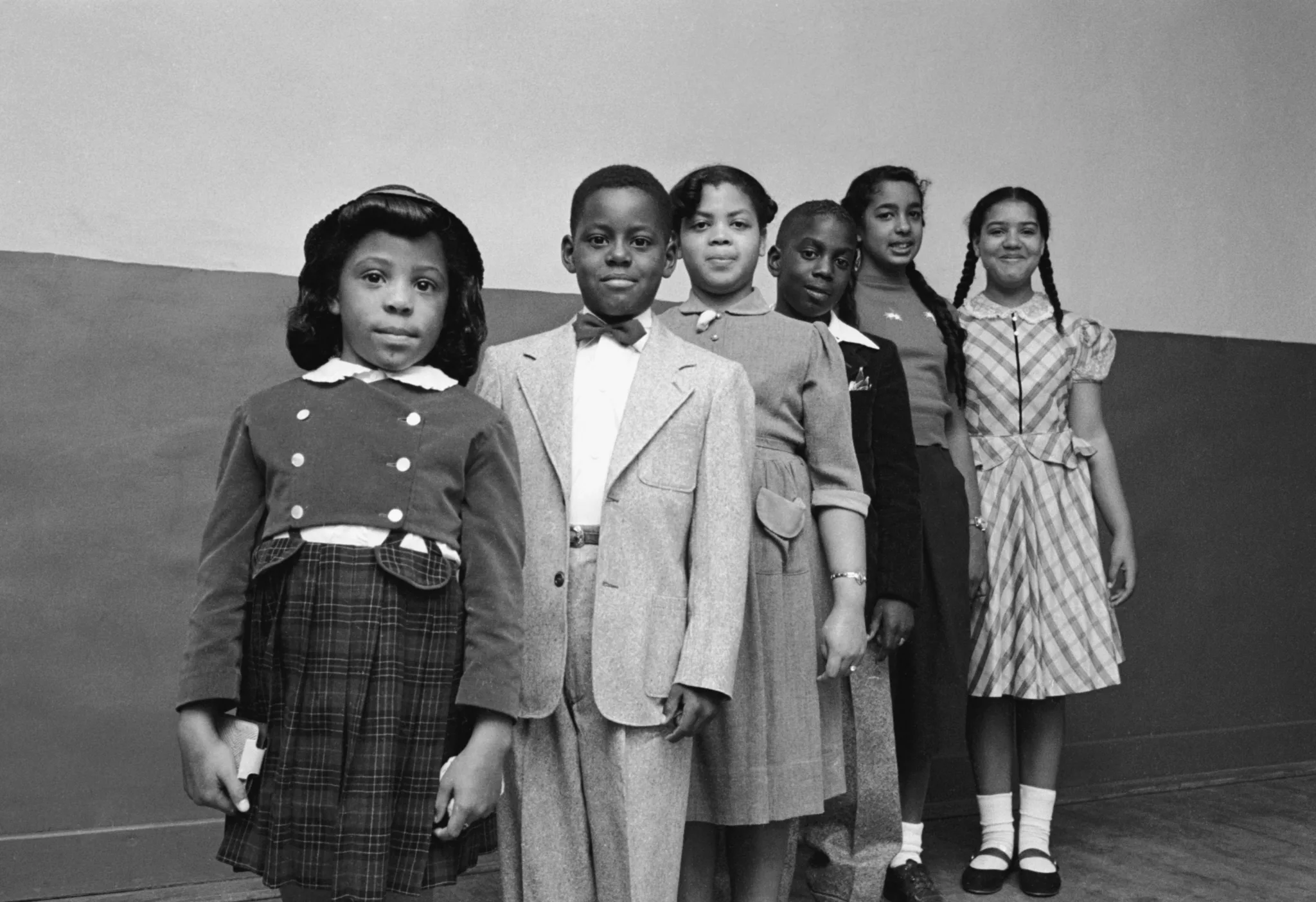 Portrait of the children involved in the landmark Civil Rights lawsuit 'Brown V. Board of Education,' which challenged the legality of American public school segregation, Topeka, Kansas, 1953. From front, Vicki Henderson, Donald Henderson, Linda Brown (the 'Brown' of the case's name), James Emanuel, Nancy Todd, and Katherine Carper. (Photo by Carl Iwasaki/Getty Images)
