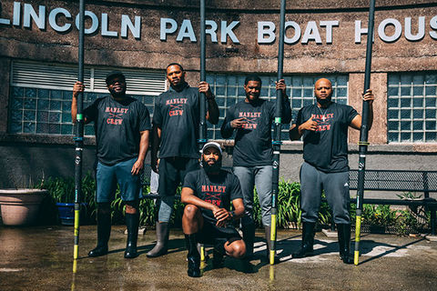 A Most Beautiful Thing. Five Black men posing in front of the Lincoln Park Boat House with oars.