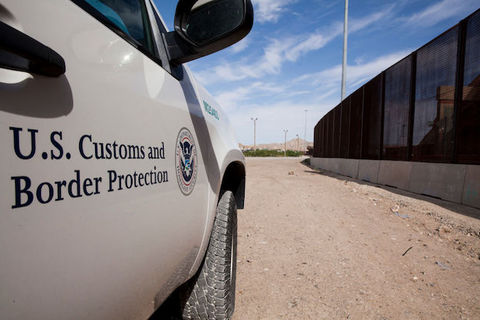 Vehicle shown with U.S. Customs and Border Protection written in black on the white door. 