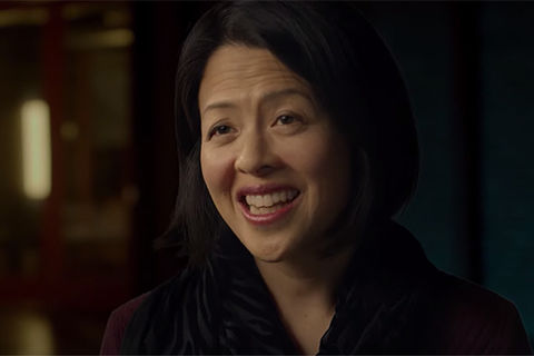 Jeanne Tsai. Asian American woman with shoulder length black hair, wearing a black top.