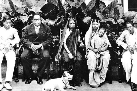 B.R. Ambedkar. Black and white archival photo of an Indian family consisting of five members and dog.