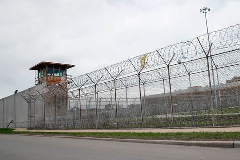Barbed wire shown outside of a federal prison.
