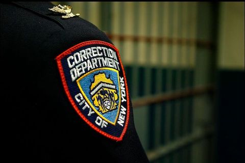 Close up shot of a Correction Department badge on an officer at the Vernon C. Bain Correctional Center at Rikers Island, in the Bronx, New York.