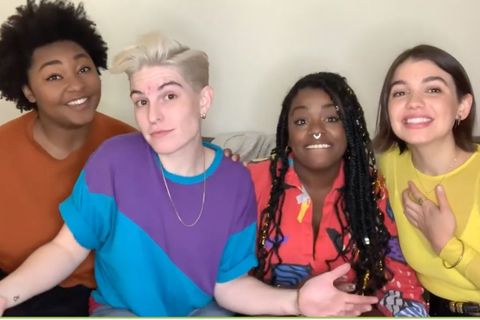 Queer the Census. Four people, black woman with afro, white person with short haircut, black woman with locs, Latinx woman with bob smiling, sitttng on a couch together