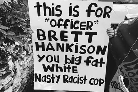 Protest sign. "This is for 'officer' Brett Hankison you fat white nasty racist cop."