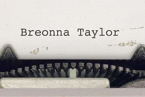 Breonna Taylor ad. Close up of typewriter keys and white page with the words: Breonna Taylor.