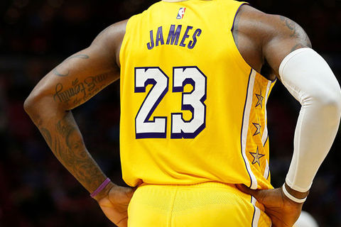 Lebron James Jersey. Close up of back of James LA Lakers yellow jersey with white number 23.
