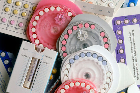 A collection of different packages and brands of oral contraception