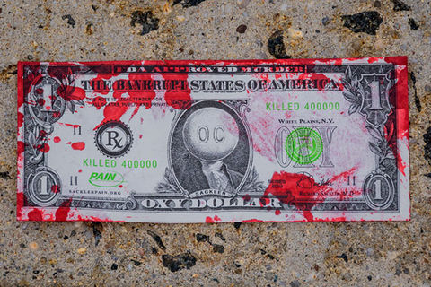 Oxy Dollar. A bloodied $1 bill with a pill replacing the face of George Washington.