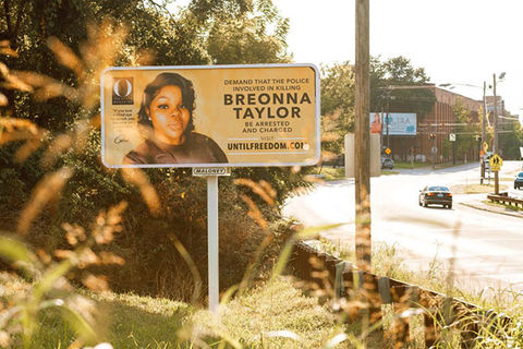 Breonna Taylor. Street ad with a photo of Breonna Taylor, a Black woman killed by police.