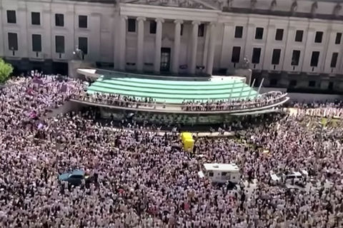 Black Trans Lives Rally. Exterior of museum with thousands of people standing outside.
