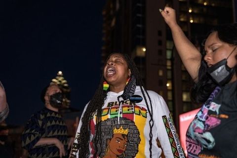 Community members and activists protest the killing of George Floyd