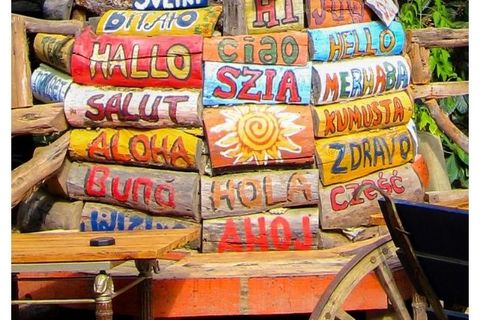 The word "hello" spelled out in different languages on brightly painted pieces of wood