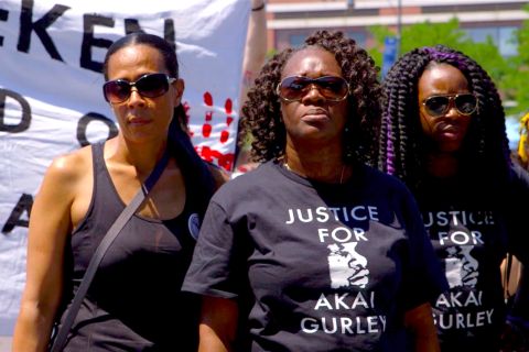 Akai Gurley's Aunt, Hertencia Petersen wears a t-shirt that reads: Justice for Akari,