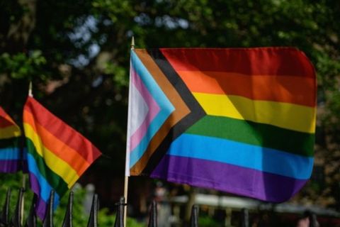  A Progress Pride flag and rainbow flags are seen at the Stonewall National Monument