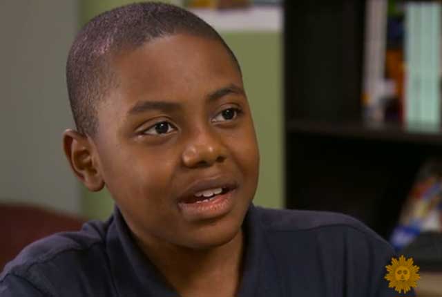 In Ferguson, an 11-Year-Old Boy Grabs the Mic