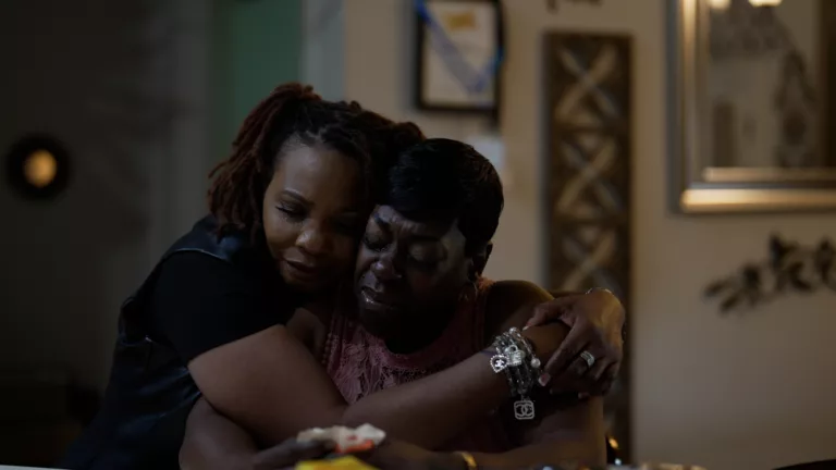 2 formerly incarcerated women comfort each other