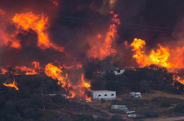 Thousands Evacuated As Uncontained Wildfire Rages through San Bernardino County