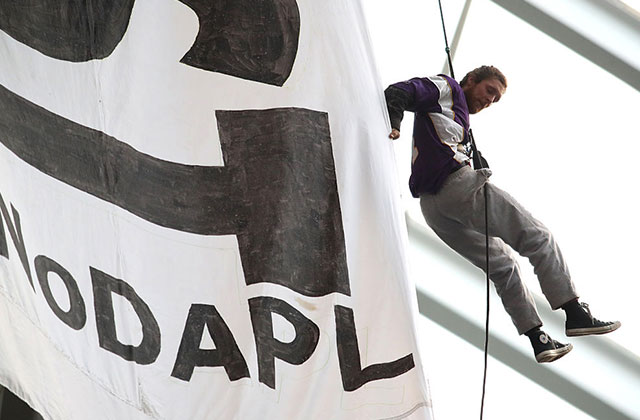 3 Water Protectors Released From Jail After Dropping Banner During Football Game
