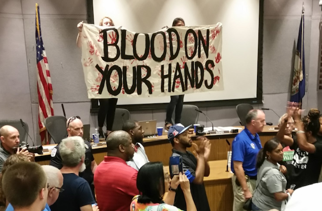 Charlottesville Residents Call for Justice, City Council Votes to Cover Confederate Monuments